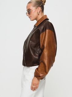 Oversized bomber jacket  Faux leather, classic collar, exposed zip fastening, internal hem toggles, contrast sleeves, twin hip pockets  Non-stretch material, fully lined     55% PU 45% polyester Casual Workwear Outerwear With Contrast Color, Casual Outerwear With Contrast Color For Work, Brown Leather Jacket With Zip Cuffs For Fall, Fall Leather Jacket With Contrast Collar, Fall Brown Outerwear With Contrast Collar, Retro Fall Outerwear With Contrast Collar, Leather Jacket With Contrast Collar For Streetwear, Trendy Brown Collared Leather Jacket, Brown Long-sleeved Outerwear With Contrast Color