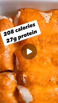 a casserole dish filled with cheese and other toppings that reads 28 calories 27 protein