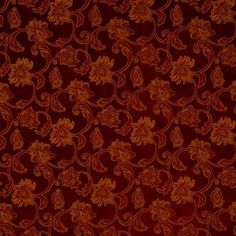 a red and gold wallpaper with an intricate design on the bottom half of it