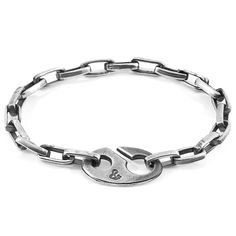 The Windsor Mooring Silver Chain Bracelet was both designed and skilfully handcrafted completely in Great Britain. Combining British craft manufacturing with a discerning modern-minimalist style. Solid .925 sterling silver chain in a Windsor link pattern (GB) Secure solid .925 sterling silver button-shaped hook clasp (GB)  This bracelet is covered under a 1-year brand warranty, and care instructions are included within the packaging of every purchase. The guarantee does not cover against damage Geometric Bracelet, Twisted Bracelet, June Birthstone Jewelry, Mens Leather Bracelet, Silver Chain Bracelet, Jewelry Ring Box, Men's Jewelry Rings, Pearl Jewellery Earrings, Hook Clasp