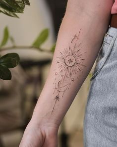 a person with a tattoo on their arm