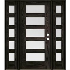 a black double door with glass panels