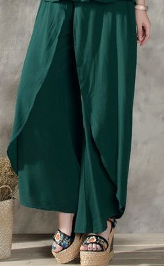 Fit Type: LoosePant Style: Wide Leg PantsFront Style: FlatWaist Type: MidFabric Type: BroadclothMaterial: Cotton, LinenLength: Ankle-Length PantsClosure Type: Elastic Waist SKU: 1475000 Baggy Green Wide Leg Pants With Elastic Waistband, Green Solid Color Wide Leg Summer Pants, Green Solid Color Wide Leg Pants For Summer, Summer Wide Leg Full Length Pants, Summer Long Wide Leg Pants, Summer Green Wide Leg Pants, Green Wide Leg Harem Pants, Green Solid Wide-leg Pants, Green Wide Leg Pants Loosely Fitted