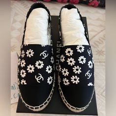 Brand New In Box Size 37 Floral Chanel Espadrilles. These Have A Silver Cc Hardware On The Sides. These Will Be At 36.5 And 37. Box, Ribbon, Camellia, And Two Dust Bags Are Included Designer White Espadrilles With Woven Sole, Designer White Espadrilles With Round Toe, Luxury White Espadrilles For Spring, Designer Black Espadrilles For Spring, Luxury Black Espadrilles For Spring, Black Designer Espadrilles For Spring, Designer Round Toe Espadrilles For Beach, Designer Beach Espadrilles With Round Toe, Designer Flat Heel Espadrilles For Beach