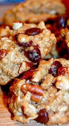 cookies with nuts and raisins are stacked on top of each other