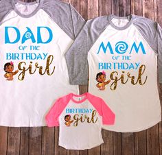 two shirts with the words, dad of the birthday girl and mom of the birthday girl printed on them