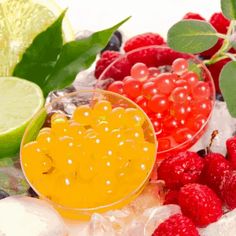 various fruits and ice on a white surface