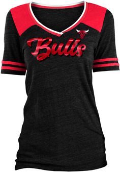 Let everyone know who you root for in this Chicago Bulls Black Training Camp V Neck Short Sleeve T-Shirt! This Chicago Short Sleeve Tee features a screen print team name on center chest and team logo on left chest with foil decoration. Tri-blend jersey body, Contrast team color yoke, Contrast color sleeve stripes and commercial trim, Screen print team graphics, 100% COTTON V-neck Tops For Sports Events In Team Colors, Black Tops With Team Logo For School Spirit, Team-colored Jersey Tops For Sports Events, Jersey Tops For Sports Events In Team Colors, College Jersey Tops With Team Logo, Sporty Jersey Tops With Team Logo, Jersey Tops For Sports Season Fan Gear, Black Tops For College Football Season, Varsity Moisture-wicking Top For Football Season