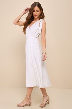 Your trend-setting wardrobe just wouldn't be complete without an essential look like the Lulus Charming Tendencies White Surplice Wrap Midi Dress! Lightweight linen-blend woven fabric shapes this sweet dress that features a sleeveless bodice with a flirty surplice neckline, a V-cut back, and long straps that tie at the shoulders. The flattering wrap silhouette features slender ties that secure at the side, before falling to a chic midi hem. Fit: This garment fits true to size. Length: Mid-calf l Adhesive Bra, Surplice Neckline, Wrap Midi Dress, Sweet Dress, V Cut, Strapless Bra, V Cuts, Full Skirt, Mid Calf