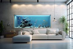 a living room filled with furniture and a large fish tank on top of the wall