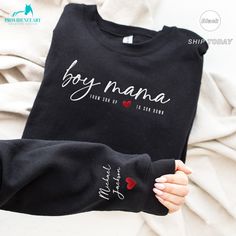 "❤️ This sweatshirt, humorously embroidered with \"Boy Mama\" and personalized with her kid's name, celebrates the fun, challenges, and unconditional love of raising boys. Perfect for the mom who tackles every mess and mischief with a smile. Show her how much you value her endless energy and love with a gift that's as special and unique as her role. Ideal for the superhero mom who deserves a day filled with laughter, relaxation, and recognition. ❤️ P R O D U C T * I N F O Minimalistic, casual, a Superhero Mom, Raising Boys, Unconditional Love, Embroidered Sweatshirts, Clothes Gift, Kid Names, Fleece Fabric, Unisex Fashion, Unisex Sweatshirt