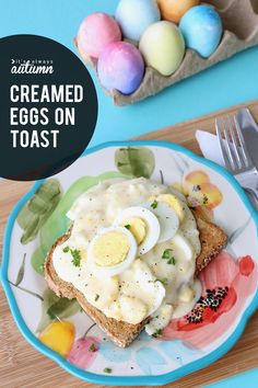 a plate with eggs on toast next to an egg carton