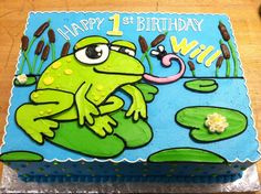 a birthday cake with a frog on it