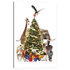 a christmas tree with animals around it and a giraffe standing on the top