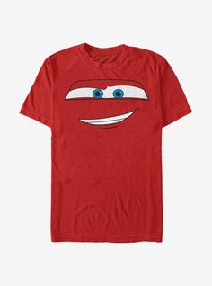 a red t - shirt with a face drawn on it