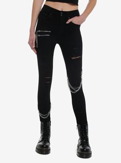 Baddies love skinny jeans and hardware! Make your outfit more edgy with these black jeans! Featuring destruction down the legs  plus silver-tone chain detailing. Comes with classic 5-pocket styling  plus zipper and chain accents on the thigh.73% cotton; 25% polyester; 2% elastaneWash cold; dry lowStretchy materialRise: 11''Inseam: 27''ImportedListed in junior sizesModel is 5'10''Model wears size 3 Jeans With Chains, Daughter Of Zeus, Disney Dragon, Make Your Outfit, Emily The Strange, Torn Jeans, Blue Beetle, The Big Lebowski, Ghost Rider