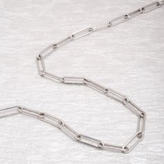 Your go-to basic chain necklace for that everyday wear. This Paperclip Chain Necklace can be worn with the toggle clasp in the back or in the front. The 2" extension allows you to wear this necklace as a choker or as a regular-length necklace. Wear this on its own or layer it with other Miki & Jane necklaces and pendants. Designed in New York. Ethically sourced materials. This is a Sterling Silver piece with Rhodium plating. Avoid contact with hairspray, perfume, hand sanitizer, and lotion. Avoi Silver Toggle Necklace With Chain For Everyday, Everyday Silver Toggle Necklace With Chain, Classic Toggle Necklace With Rectangular Links And Cable Chain, Everyday Sterling Silver Chunky Chain Necklace, Everyday Chunky Chain Necklace In Sterling Silver, Classic Toggle Necklace With Oval Link Cable Chain, Silver Toggle Necklace With Oval Link And Cable Chain, Classic Silver Chain Link Paperclip Bracelet, Minimalist Jewelry With Chunky Paperclip Chain