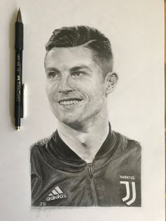 a pencil drawing of a man with a soccer jersey on and a pen next to it