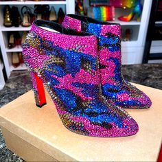 Nwt Louboutin Eleonor Bling Bang Booties. These Are Absolutely Insanely Gorgeous. The Sparkle Is Unreal. The Iridescent Color Changes To Shades Of Pinks, Purples, Blues. Size 41 But Runs Small. Includes Box And Dust Bag. Luxury Pink Pointed Toe Boots, Multicolor Round Toe Boots For Evening, Multicolor Round Toe Evening Boots, Luxury Pink Boots For Formal Occasions, Designer Pink Boots With Round Toe, Designer Pink Round Toe Boots, Luxury Pink Party Boots, Iridescent Color, Knee High Leather Boots