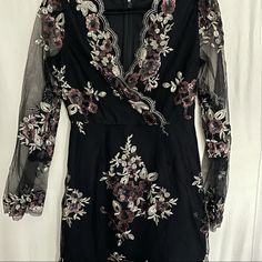 This Unique Dress Is Definitely A Showstopper. It Features Mesh Sleeves, A Flattering Black Bodice, And Sequins Beautifully Sewn Throughout To Make This Dress An Elegant Yet Sexy One. It Is Nwot And Is In Excellent Condition. No Flaws Or Stains At All! Long Sleeve Embroidered Dresses For Night Out, Embroidered Lace Dresses For Fall, Fall Embroidered Lace Dresses, Luxury Black Dress With Floral Applique, Black Embellished Long Sleeve Embroidered Dress, Luxury Floral Embroidered Dress With 3/4 Sleeves, Luxury Black Embroidered Sequin Fabric, Black Embellished Sequin Fabric, Glamorous Style, Cashmere Dress