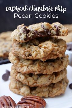 chocolate chip pecan cookies stacked on top of each other