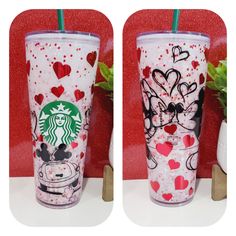 two starbucks cups decorated with hearts and mickey mouses, one has a straw in it