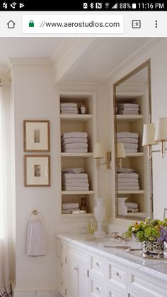 the bathroom is clean and ready to be used as a room divider for towels