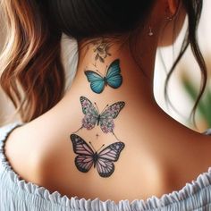 the back of a woman's neck with three butterflies on her upper and lower part