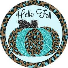 a leopard print pumpkin with glitter bow on it's head and hello fall written in the center