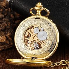 "This is a stunting gold mechanical wind up pocket watch. the front and the back open so you can see the gears at work. real nice watch for santa. i also have a pouch for this watch that fits a 4\" belt, in my store." Gold Engraved Steampunk Pocket Watch, Gold Steampunk Style Watch As Gift, Steampunk Gold Watch As Gift, Gold Steampunk Watch As Gift, Gold Steampunk Watch For Gift, Gold Steampunk Watch With Skeleton Dial, Antique Gold Watch With Skeleton Dial, Antique Gold Pocket Watch With Skeleton Dial, Gold Pocket Watch With Skeleton Dial