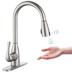 a faucet that is connected to a person's hand and touching it