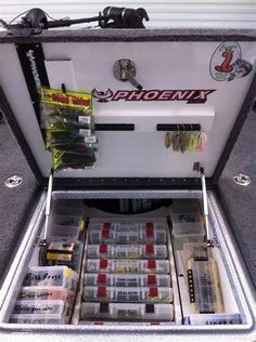 a fishing tackle box filled with lots of fish