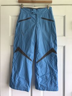 Preowned O32 Columbia Blue Ski Snow Pants Youth Girls Size 10/12.  Small spot on back of leg by cuff, otherwise very good condition.  Clean and smoke free. Columbia Blue, Ski Pants, Snow Pants, Spot On, Cargo Shorts, Columbia, Skiing, Size 10, Cuff