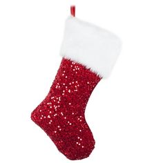 a red and white christmas stocking with sequins