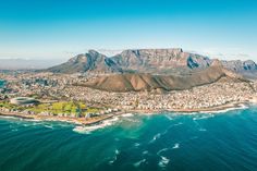 an aerial view of cape town and table mountain