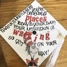 a graduation cap with the words, you're not going on your way and an image of a cat in the hat