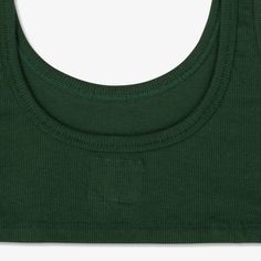 Comfort bra made of 220 g/m2 organic cotton rib jersey.
Natural support and generous comfort with a slight low back cut.
96% "GOTS" certified organic cotton - 4 % elastane.
Quality undergarments made in Portugal. Basic Green Seamless Tops, Green Cotton Tank Top With Built-in Bra, Green Stretch Cotton Crop Top, Basic Green Stretch Crop Top, Cotton Yoga Crop Top, Cotton Crop Top For Yoga, Basic Green Seamless Tank Top, Green Seamless Scoop Neck Tops, Seamless Cotton Crop Top For Everyday