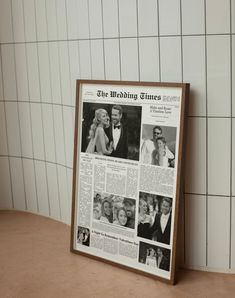 the wedding times newspaper is on display in front of a white tiled wall and floor