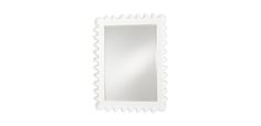 a white wall mirror with scalloped edges