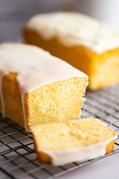 a loaf of lemon pound cake on a cooling rack