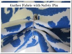 an image of a blue and white fabric with the words gather fabric with safety pin