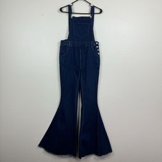 Nwt Saints & Hearts Super Flare Leg Dark Wash Blue Jean Denim Bib Overalls Large Bell Bottom Blue Jean Denim Overalls. Exaggerated Flare Leg With A Frayed Hem. Left Side Buttons. Adjustable Straps With Buckle Closure. Front Bib Pocket, 2 Hand Pockets, 2 Back Pockets. Belt Loops. Stretch. Dark Wash. New With Tags. Size Large. Approximate Measurements: Waist Across-16" Inseam-36" Hippie, Boho, Bohemian, Festival, Outdoors, Garden, Farming Garden Farming, Khaki Overalls, Denim Overalls Shorts, Boho Denim, Waxed Jeans, Black Overalls, Bohemian Festival, Jean Overalls, Summer Jeans