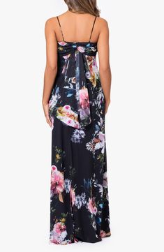 A vibrant, oversized floral print pops against a black background on this charming gown topped with a drapey cowl neckline that only adds to the romance. 60 1/2" length Hidden back-zip closure Cowl neck Spaghetti straps Lined 100% polyester Dry clean Imported Spring Evening Maxi Dress With Cowl Neck, Cowl Neck Maxi Dress For Spring Evenings, Spring Formal Maxi Dress With Cowl Neck, Multicolor Floral Print Maxi Dress For Evening, Black Floral Print Maxi Dress For Evening, Black Draped Maxi Dress For Spring, Elegant Multicolor Floral Dress For Evening, Elegant Multicolor Floral Evening Dress, Elegant Multicolor Draped Dress