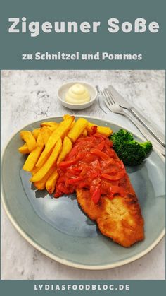 a plate with fish, potatoes and broccoli on it