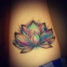 a tattoo with a lotus flower on it