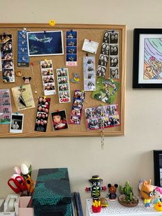 a bulletin board with pictures and magnets on it