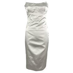 Check out this item from 1stdibs! NWT S/S 2001 Gucci by Tom Ford Runway Ad Corset White Silk Satin Strapless Dress: https://www.1stdibs.com/id-v_20755212 Gucci Silk Dress For Wedding, Gucci Silk Wedding Dress, Gucci Silk Dress For Gala, Sleeveless Gucci Cocktail Dress, Gucci Formal Summer Dresses, Chic Gucci Dress For Gala, Silk Strapless Dress With Straight Neckline For Cocktail, Elegant Satin Strapless Dress For Dinner, Gucci Silk Party Dress