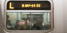 people sitting on a train looking out the window