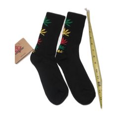 Hemp Leaf Socks Mary Jane Socks One Pair One Size Long Thick Black Sock With Green Red Yellow Leafs Approximately 14" 95% Polyester 5% Spandex Machine Wash Warm With Like Colors Use Only Non-Chlorine Bleach When Needed Tumble Dry Medium Made In China Not From A Smoke-Free Home But Unopened In Plastic Bundle For Better Prices! Casual Green Knee-high Socks, Casual Yellow Socks For Stocking Stuffers, Casual Black Knee-high Socks, Casual Multicolor Socks For Streetwear, Haribo Gummy Bears, Black Beer, Hemp Leaf, Mens Crew Socks, Black Socks