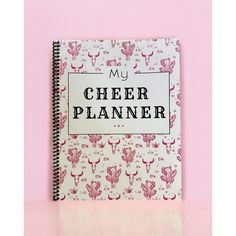 a notebook with the words'my cheer planner'written on it